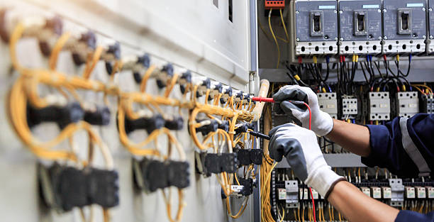 Professional Electrician technician working in Fairhope, AL